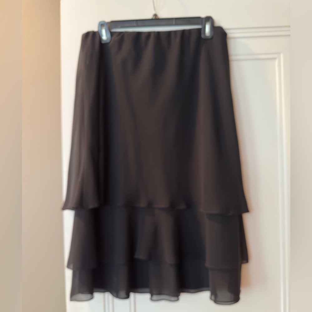 Evening attire. Sheer A-line black, short, tiered skirt. Size Large.